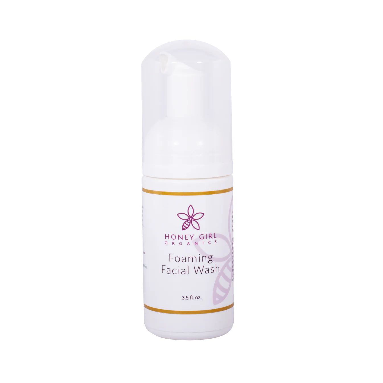 White bottle of foaming facial wash with purple logo and gold accents on a plain background.