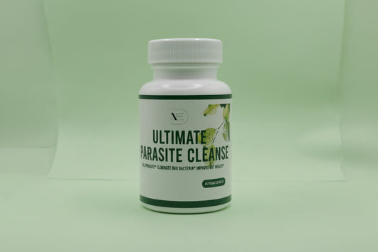 White bottle labeled "Ultimate Parasite Cleanse" on a light green background.