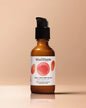 Brown bottle with black pump, labeled "Mad Hippie AHA + BHA Milk Serum" on beige background.