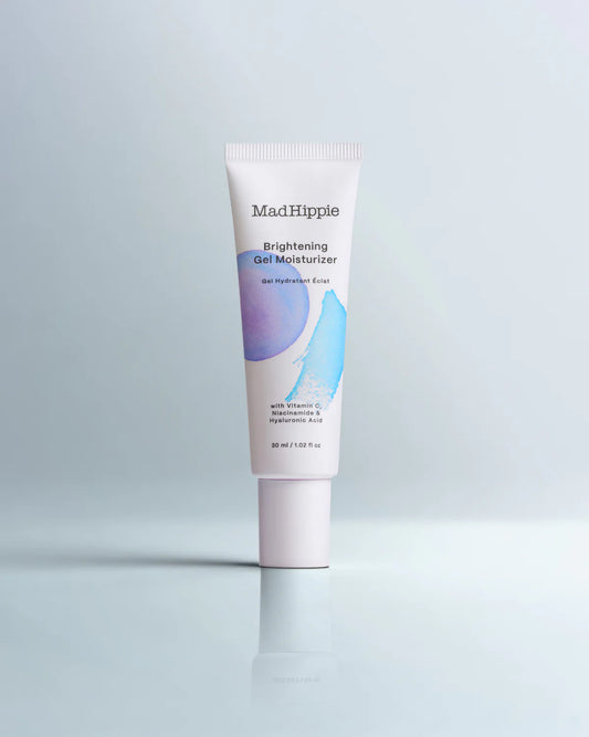 White tube of gel moisturizer with purple and blue design on a light gray background.