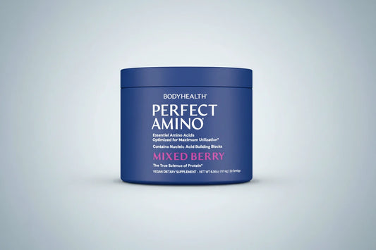 Blue container labeled "Perfect Amino Mixed Berry" with white and pink text on a light background.